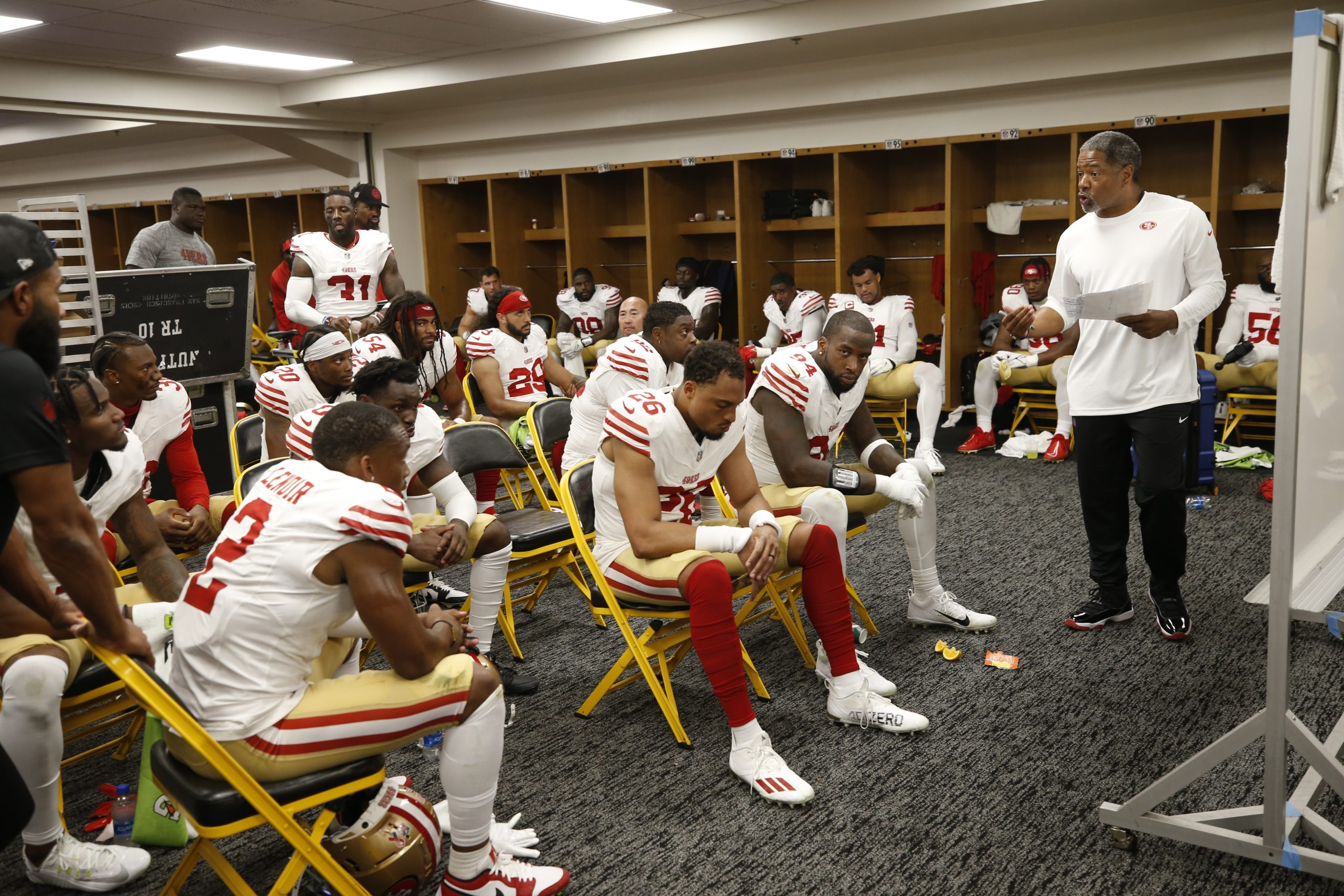 Defensive Coordinator Steve Wilks of the San Francisco 49ers talks to the defense in the locker roo...