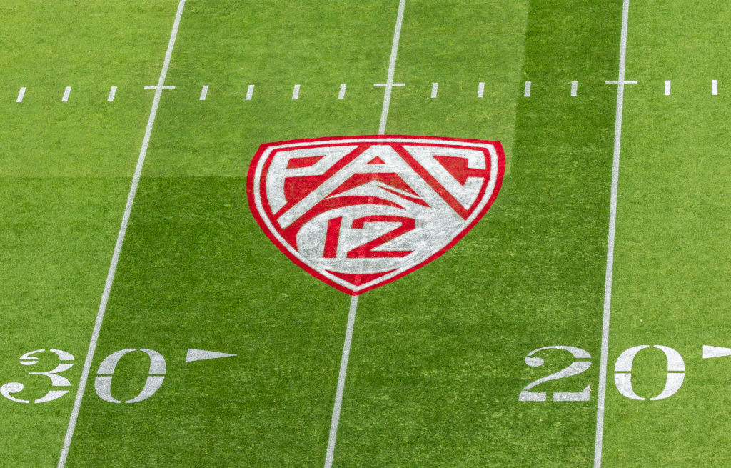A view of the Pac-12 logo on the field at Stanford Stadium during an NCAA college football game bet...