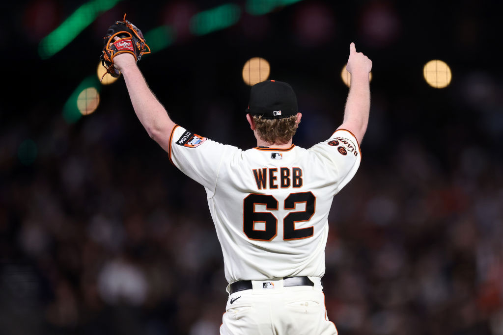 Logan Webb #62 of the San Francisco Giants reacts after the Giants turned a double play to end the ...