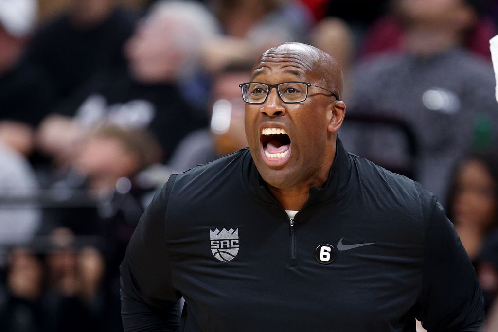 Sacramento Kings head coach Mike Brown shouts to his team during their game against the Portland Tr...