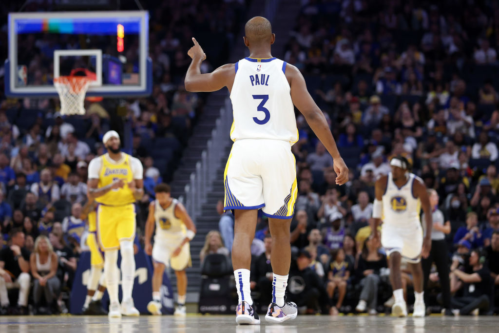 Chris Paul #3 of the Golden State Warriors points up court during their game against the Los Angele...