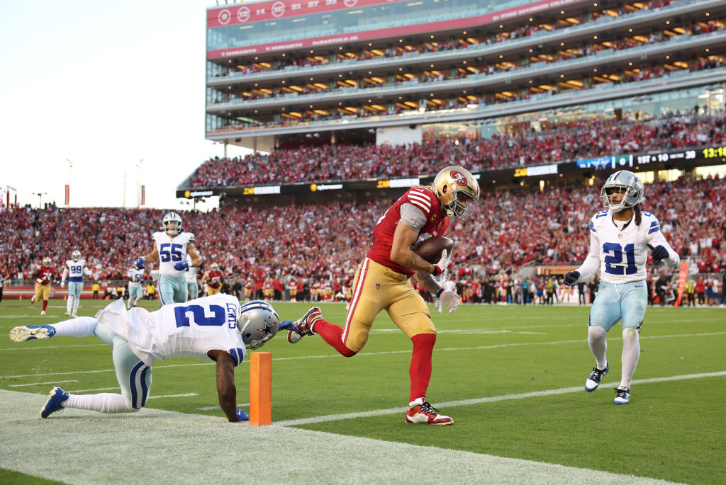George Kittle #85 of the San Francisco 49ers runs for a touchdown after a catch during the second q...