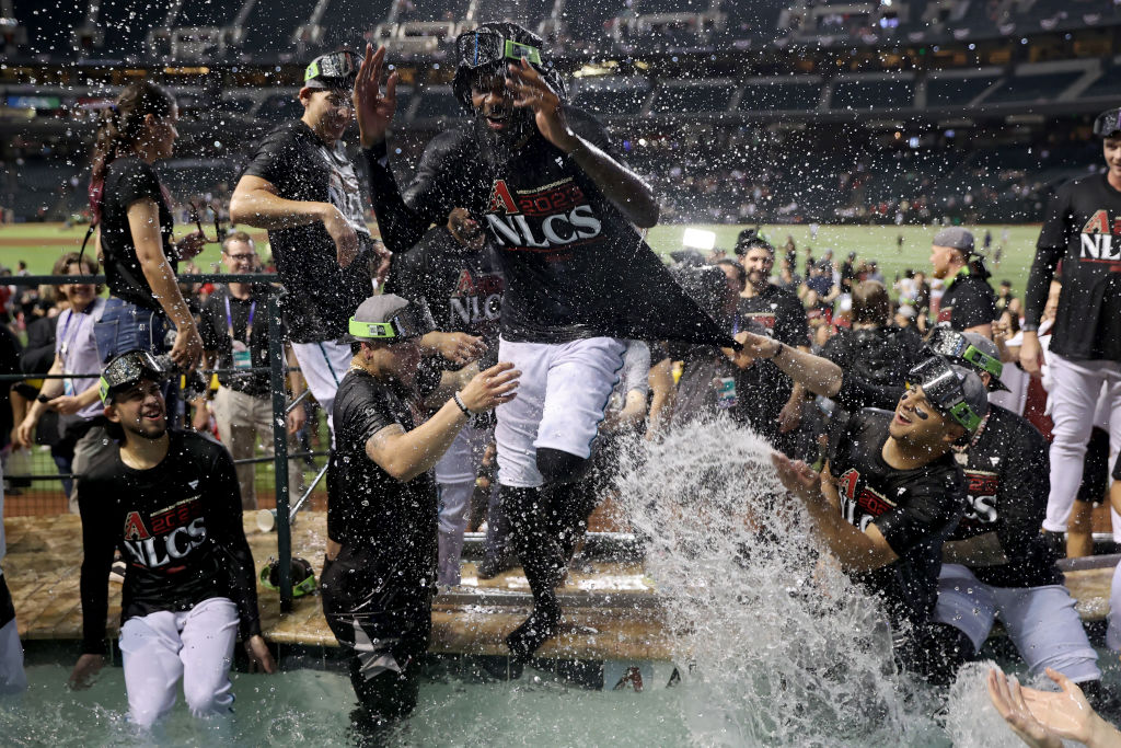 Arizona Diamondbacks celebrate in the pool after beating the Los Angeles Dodgers 4-2 in Game Three ...