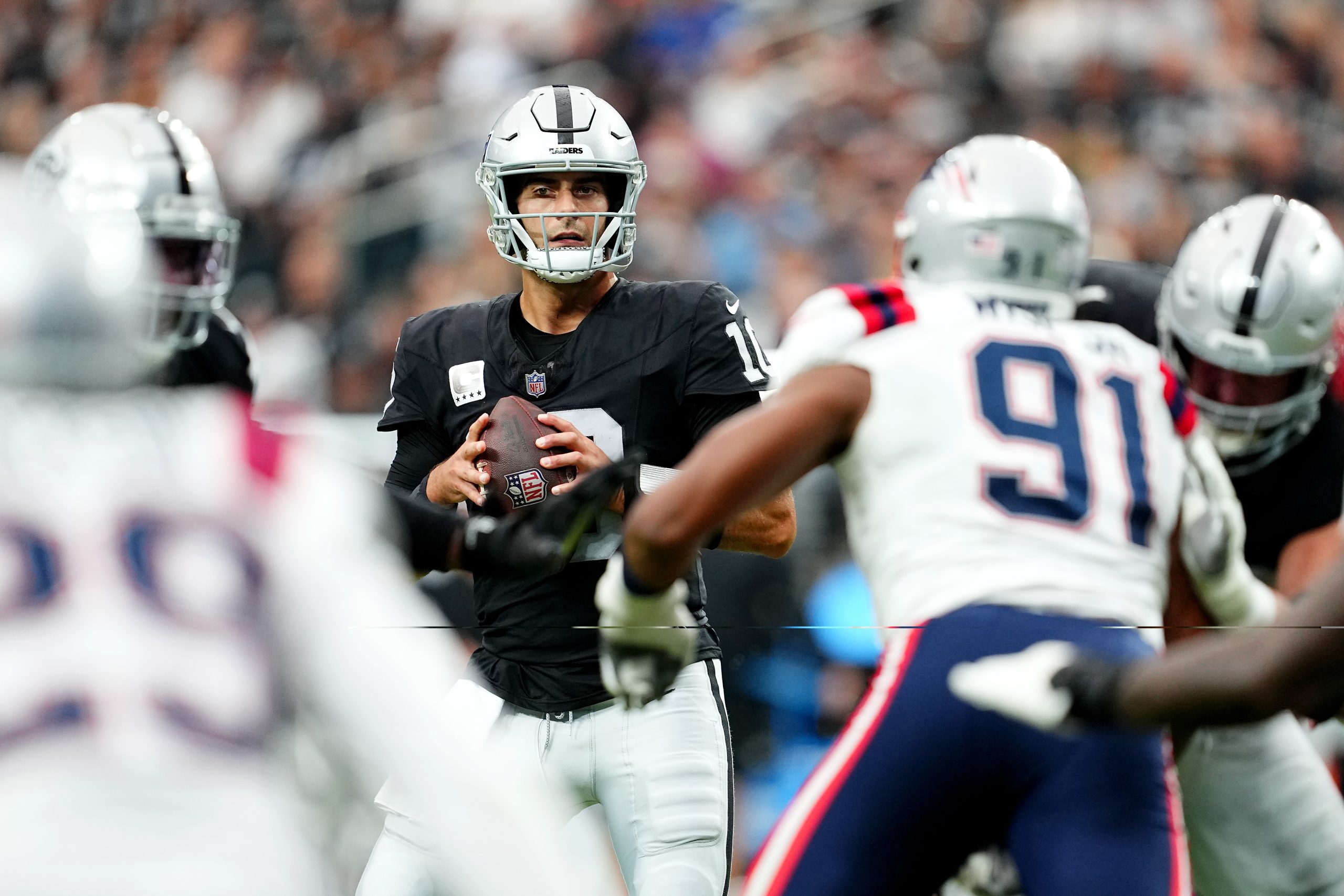 Jimmy Garoppolo #10 of the Las Vegas Raiders attempts a pass during the first quarter against the N...