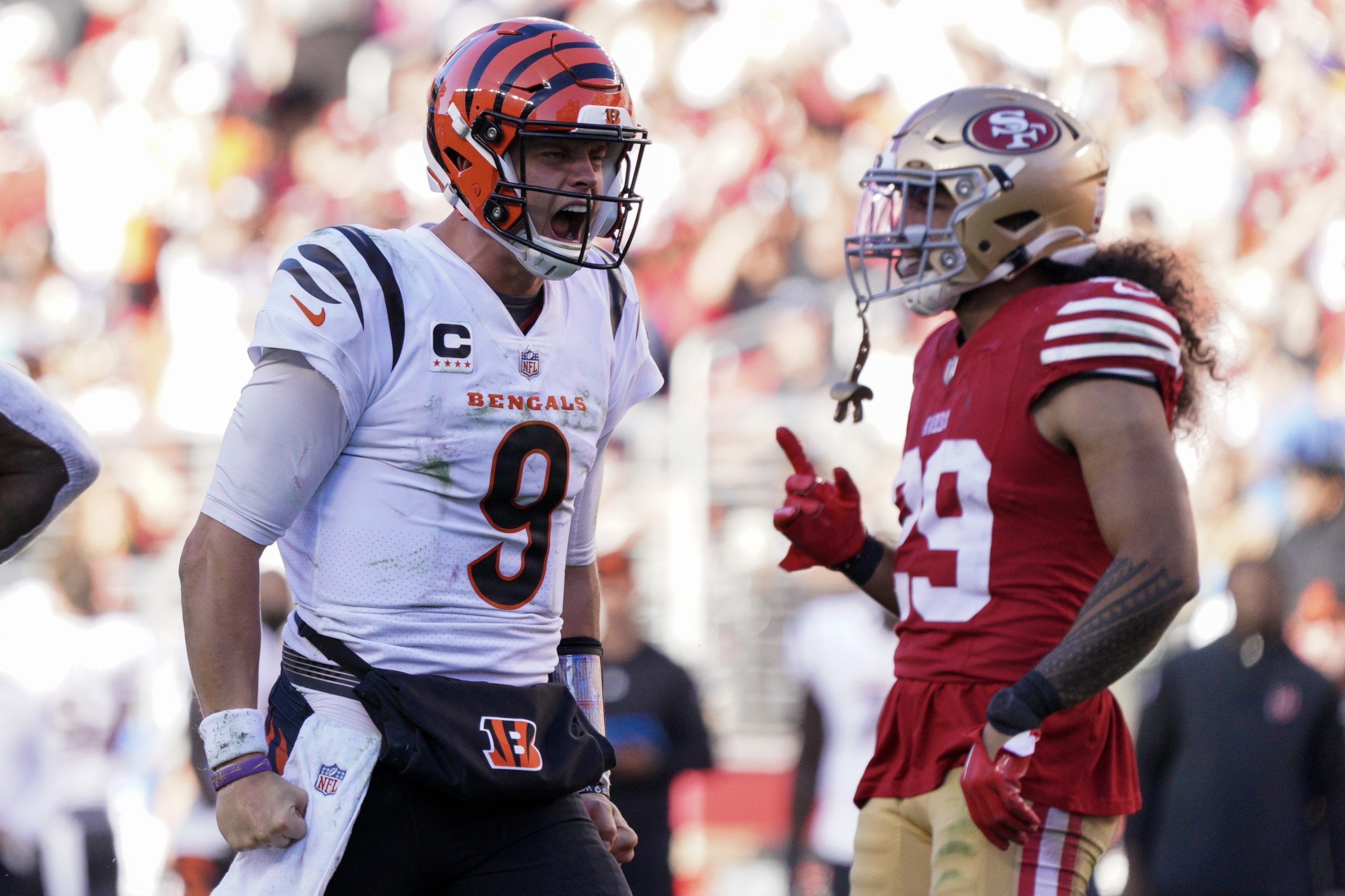 Joe Burrow #9 of the Cincinnati Bengals celebrates after a scramble during the fourth quarter of th...