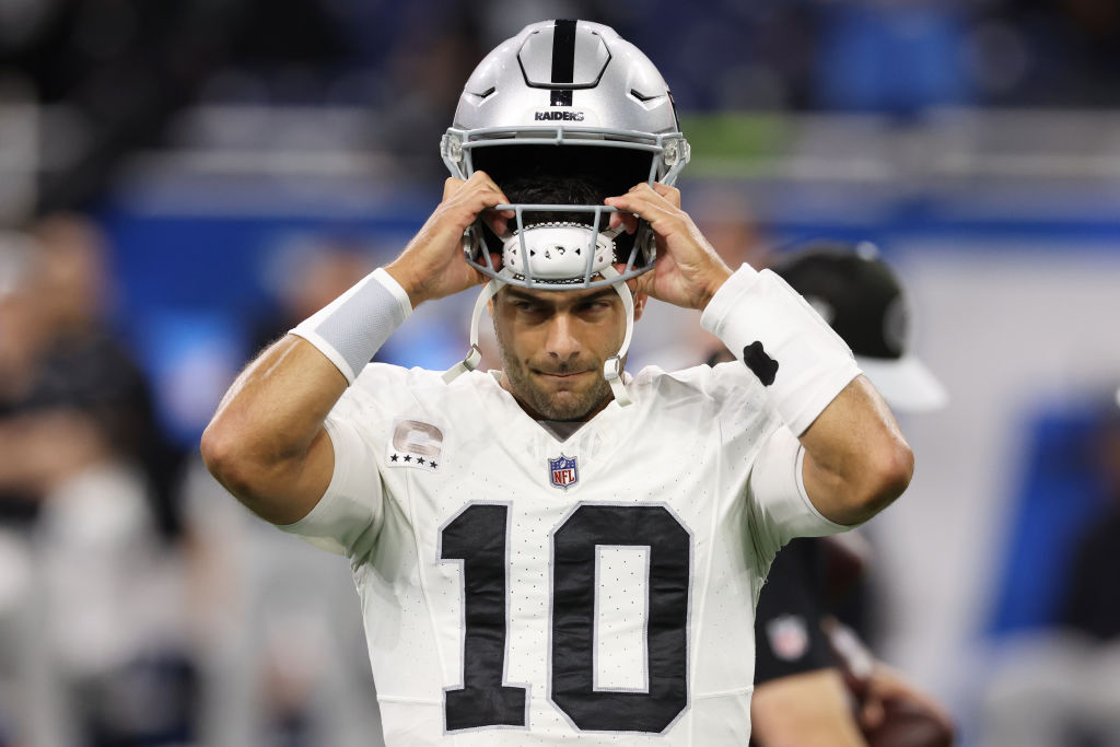 DETROIT, MICHIGAN - OCTOBER 30: Jimmy Garoppolo #10 of the Las Vegas Raiders warms up prior to thei...