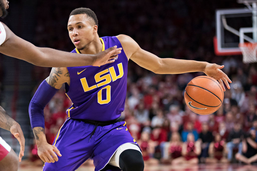 Brandon Sampson #0 of the LSU Tigers dribbles down the court during a game against the Arkansas Raz...