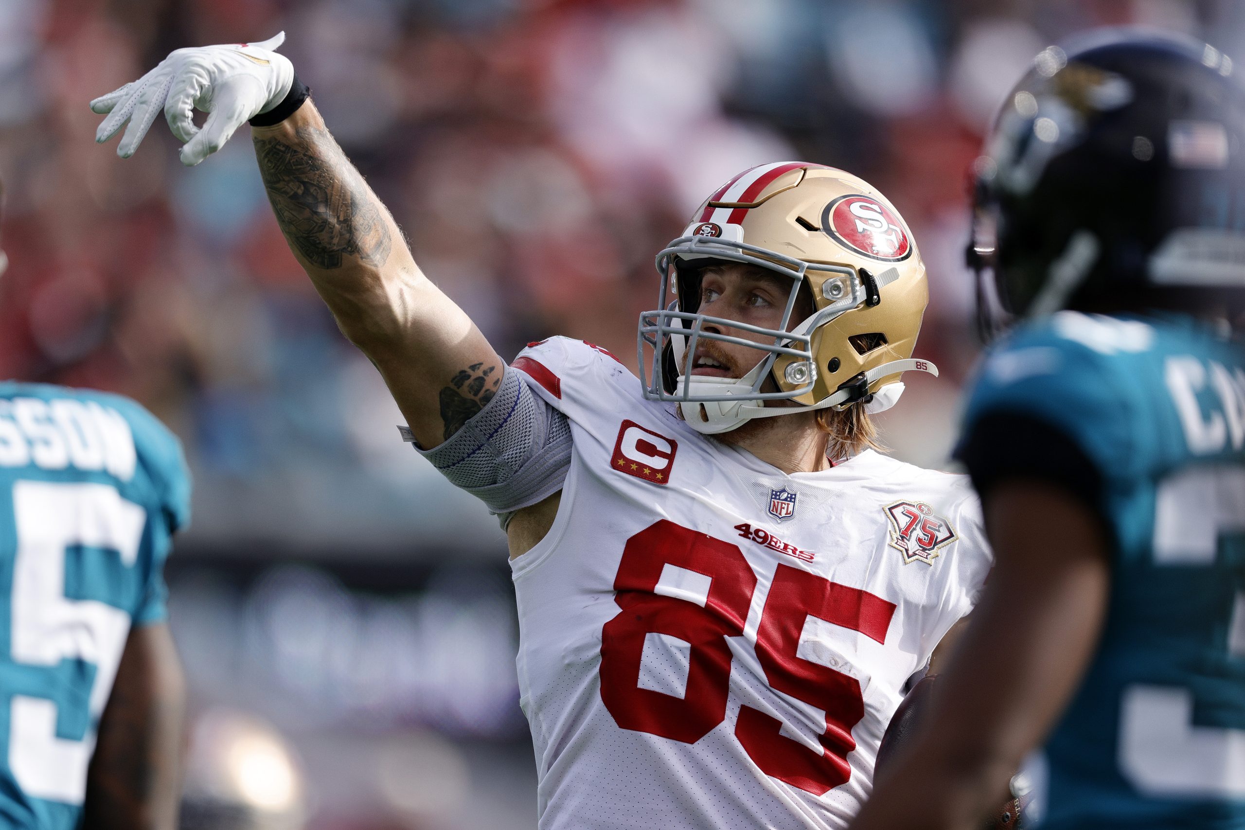 George Kittle #85 of the San Francisco 49ers reacts after a play during the second half against the...
