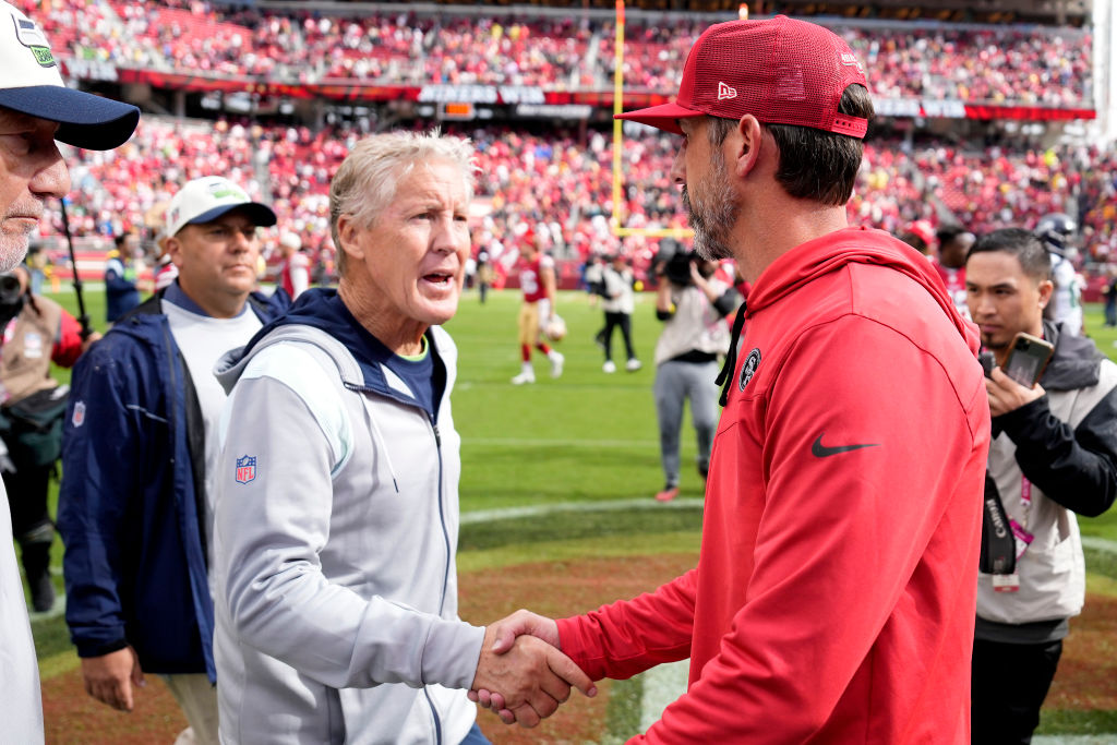 Head coach Pete Carroll of the Seattle Seahawks and head coach Kyle Shanahan of the San Francisco 4...