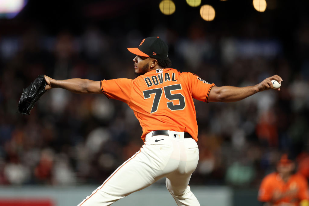 Camilo Doval #75 of the San Francisco Giants pitches against the Colorado Rockies in the ninth inni...
