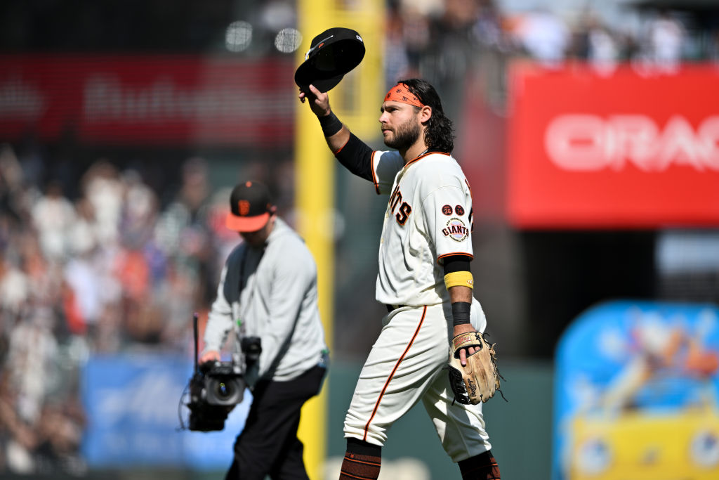 Brandon Crawford #35 of the San Francisco Giants acknowledges the crowd after he was taken off the ...