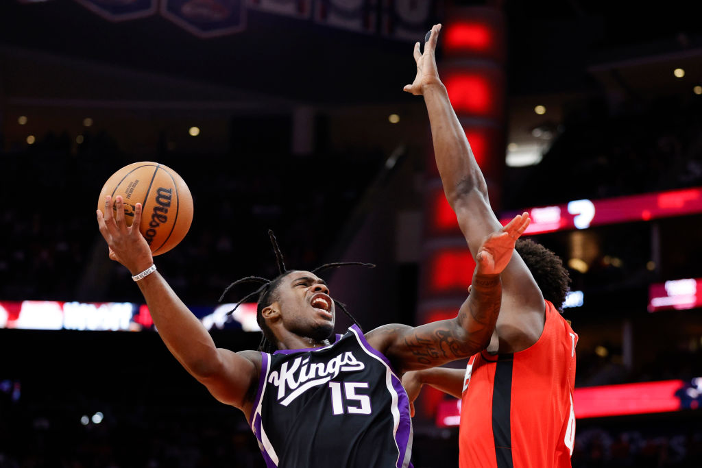 HOUSTON, TEXAS - NOVEMBER 06: Davion Mitchell #15 of the Sacramento Kings drives to the basket over...