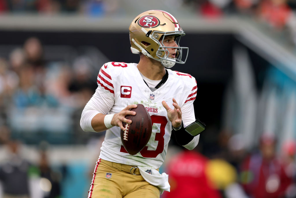 JACKSONVILLE, FLORIDA - NOVEMBER 12: Brock Purdy #13 of the San Francisco 49ers looks to pass again...