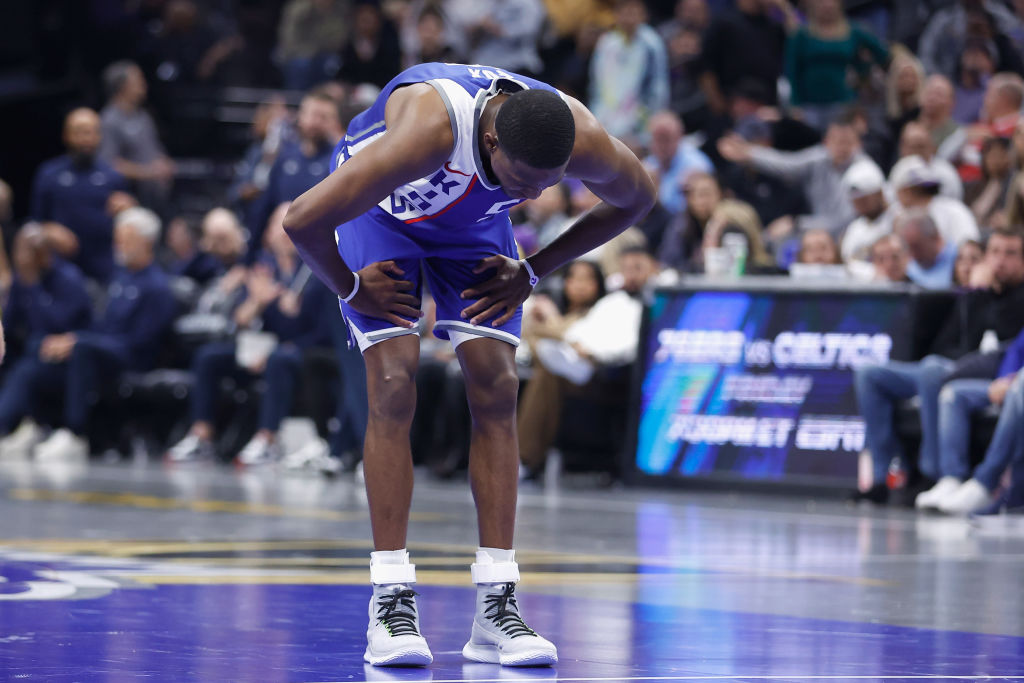 De'Aaron Fox #5 of the Sacramento Kings reacts after a play in the fourth quarter against the Golde...