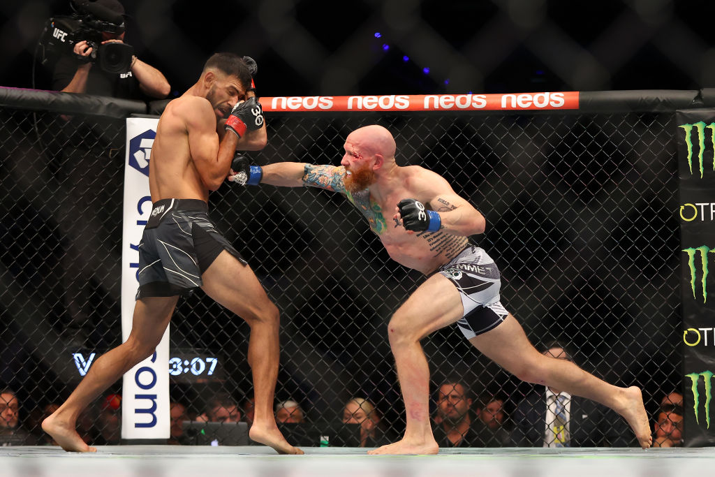 Yair Rodriguez of Mexico and Josh Emmett of the United States battle in the UFC interim featherweig...