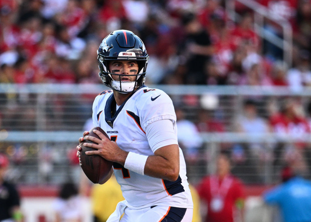 Jarrett Stidham #4 of the Denver Broncos looks to pass during the first half of a preseason game ag...
