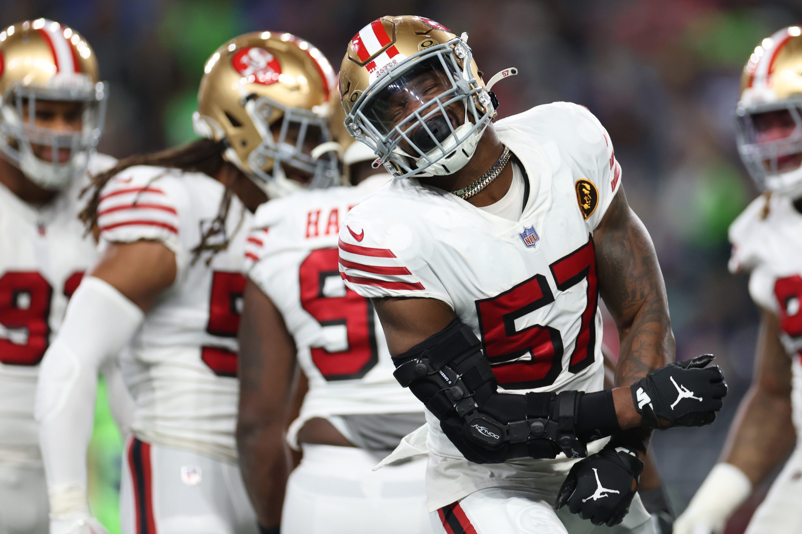 Dre Greenlaw #57 of the San Francisco 49ers reacts during the second quarter against the Seattle Se...