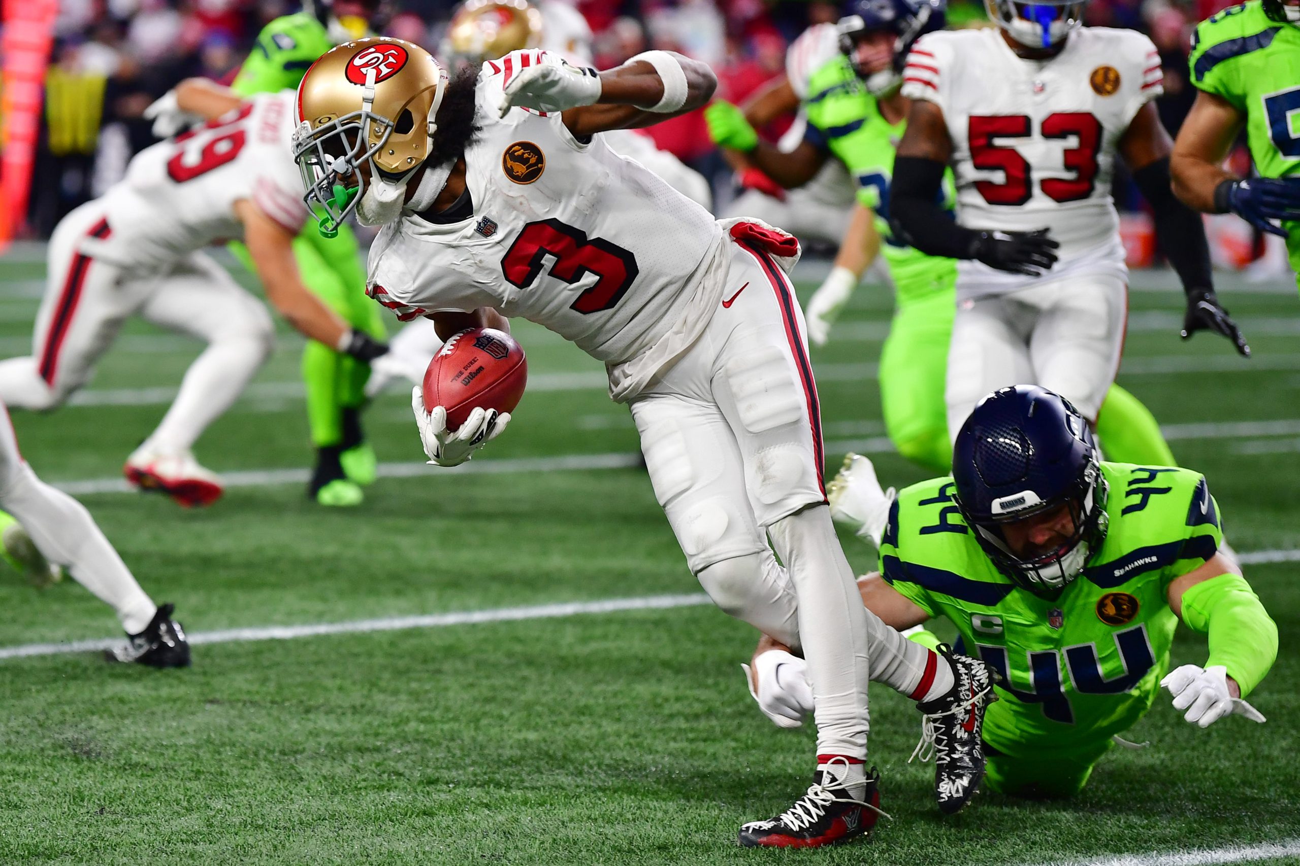 Nick Bellore #44 of the Seattle Seahawks tackles Ray-Ray McCloud III #3 of the San Francisco 49ers ...