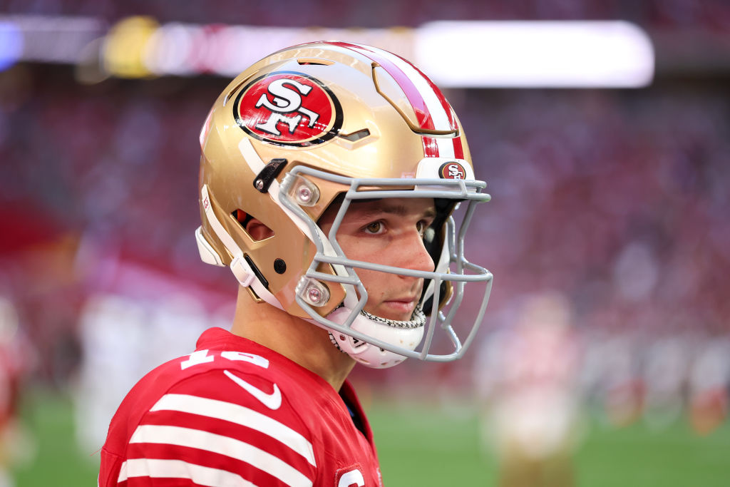 GLENDALE, ARIZONA - DECEMBER 17: Brock Purdy #13 of the San Francisco 49ers looks on during the fir...
