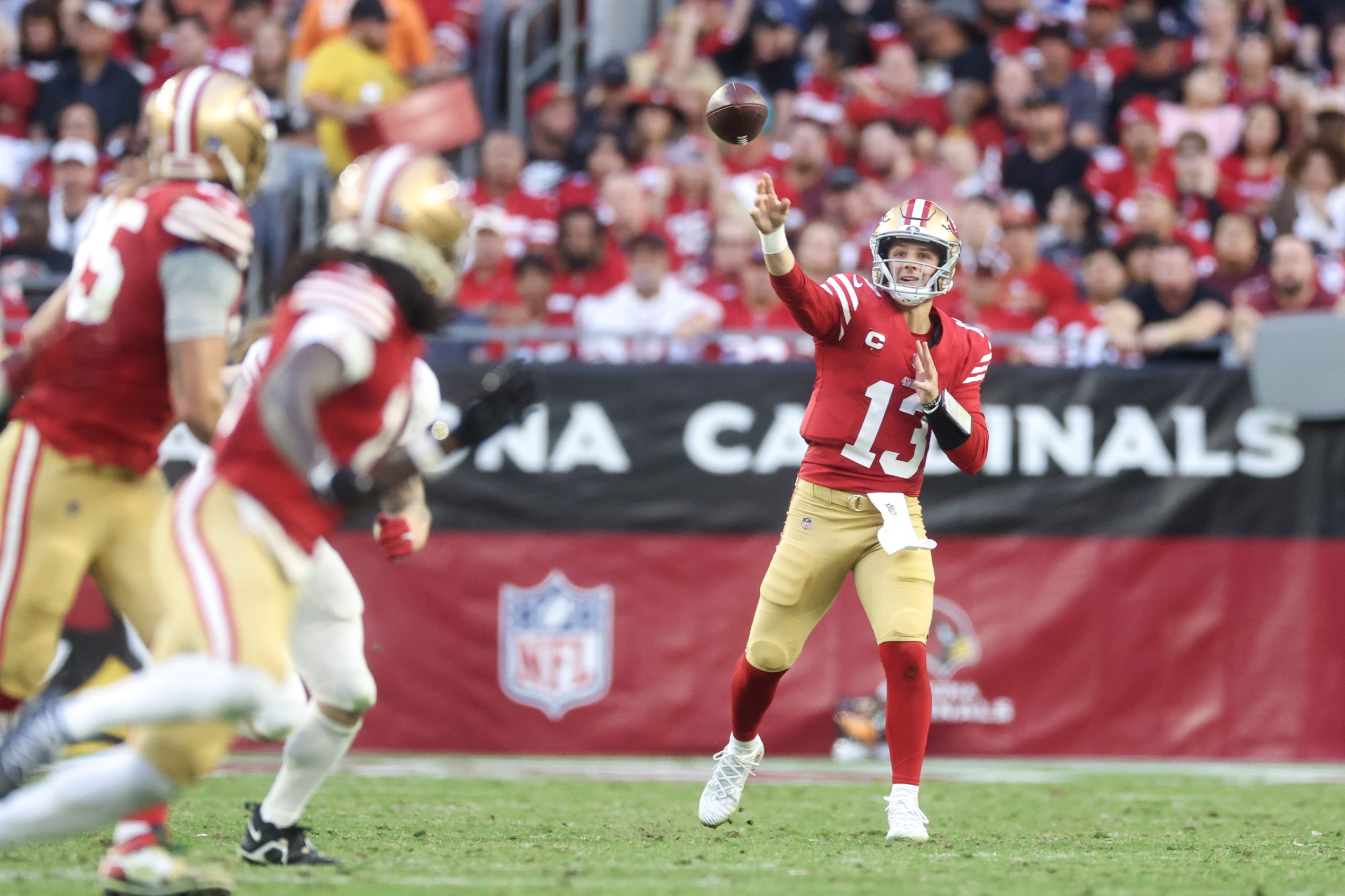 Brock Purdy #13 of the San Francisco 49ers throws a pass during the fourth quarter of a game agains...