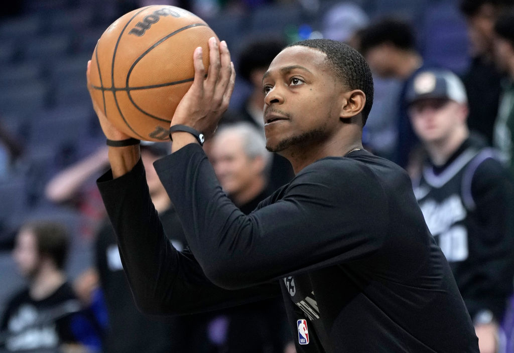 De'Aaron Fox #5 of the Sacramento Kings warms up prior to the start of an NBA basketball game again...
