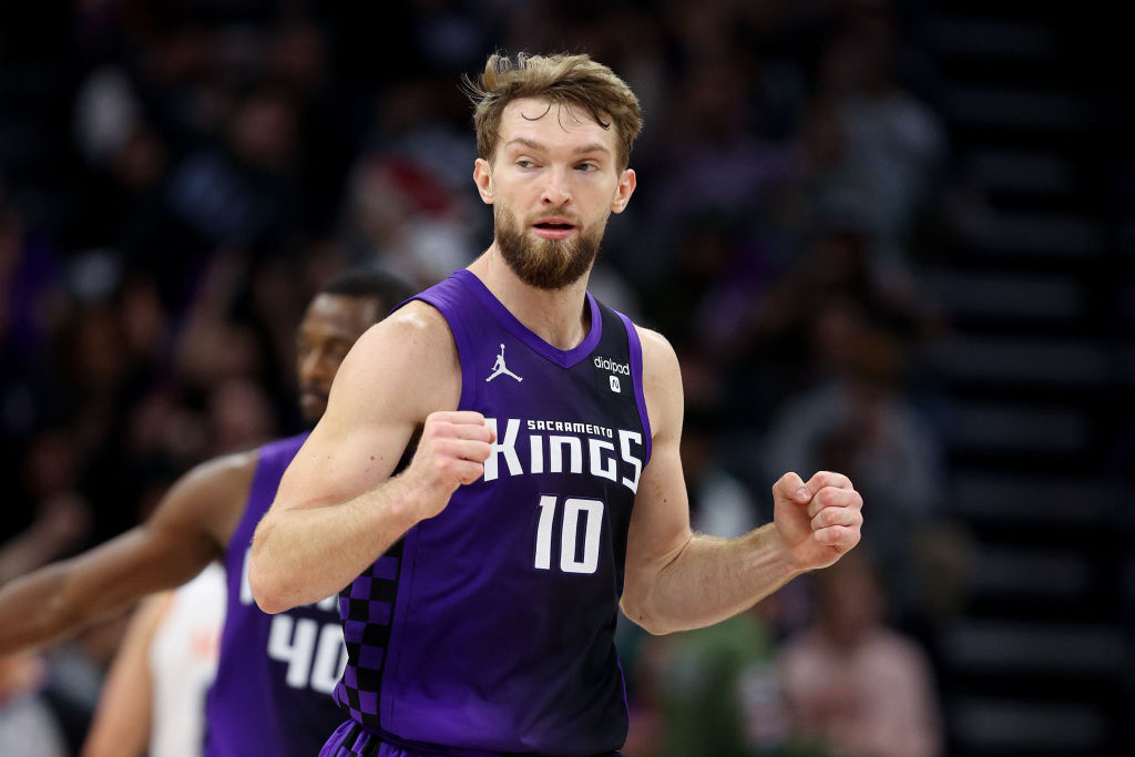 Domantas Sabonis #10 of the Sacramento Kings reacts during the second half of their win over the Ph...