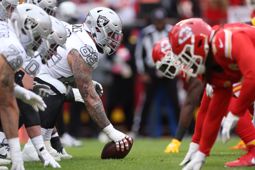 Andre James #68 of the Las Vegas Raiders prepares to snap the ball during the first quarter against...