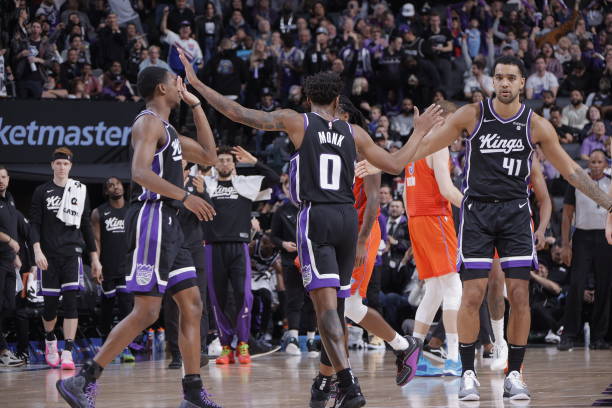 SACRAMENTO, CA - DECEMBER 14: The Sacramento Kings celebrates a three point basket during the game ...