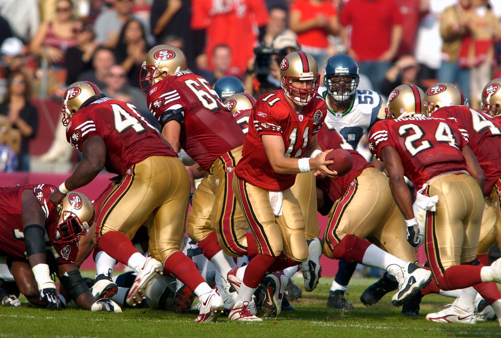 Alex Smith #11 of the San Francisco in action against the Seattle Seahawks during an NFL football g...