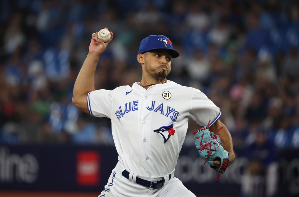 TORONTO, ON - SEPTEMBER 15 - Toronto Blue Jays relief pitcher Jordan Hicks (12) pitches the eighth ...