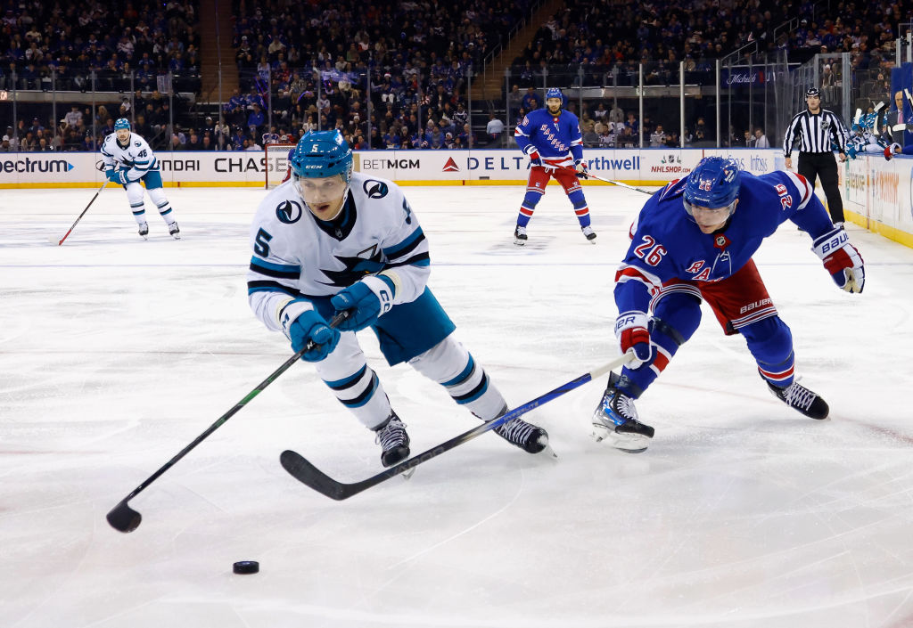 Matt Benning #5 of the San Jose Sharks skates against the New York Rangers at Madison Square Garden...