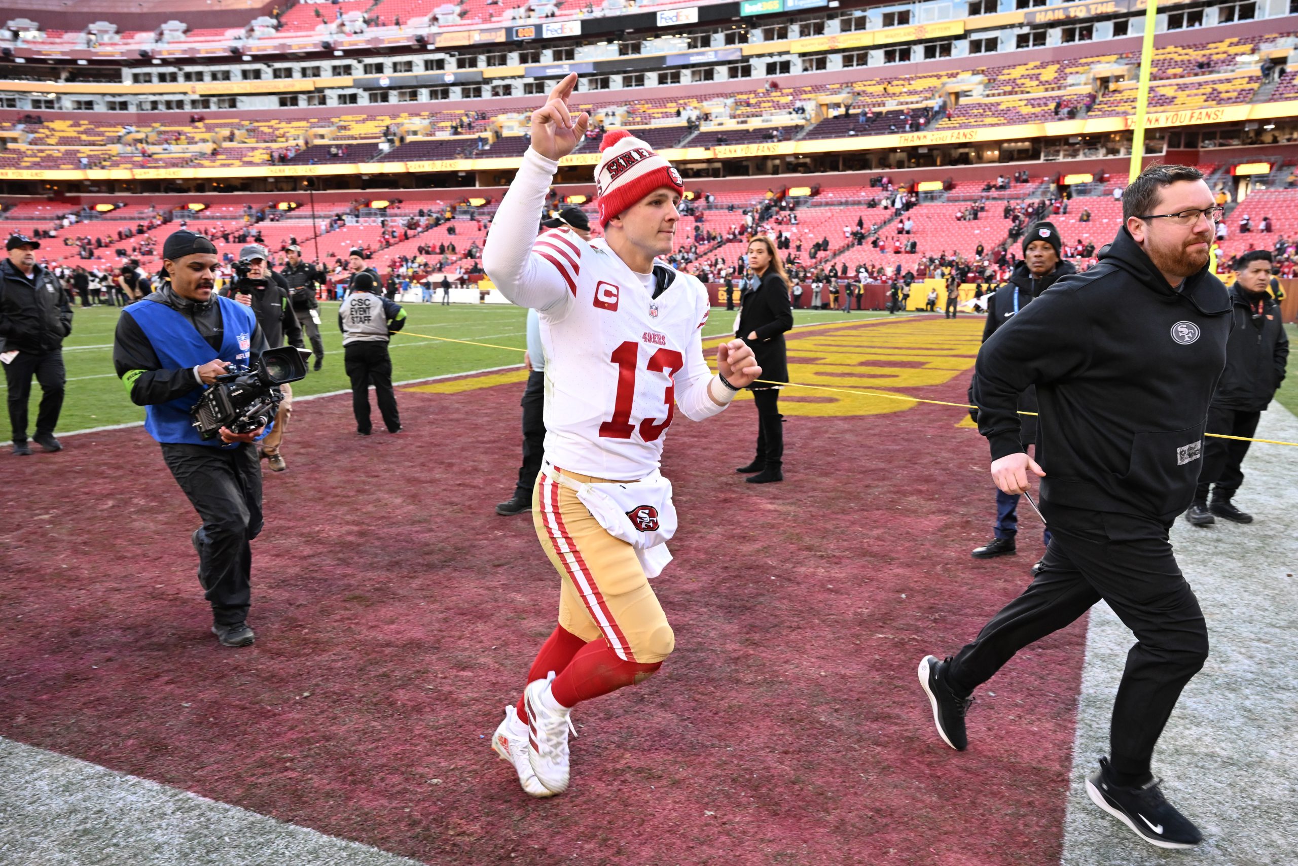 Brock Purdy #13 of the San Francisco 49ers leaves the field after a game against the Washington Com...