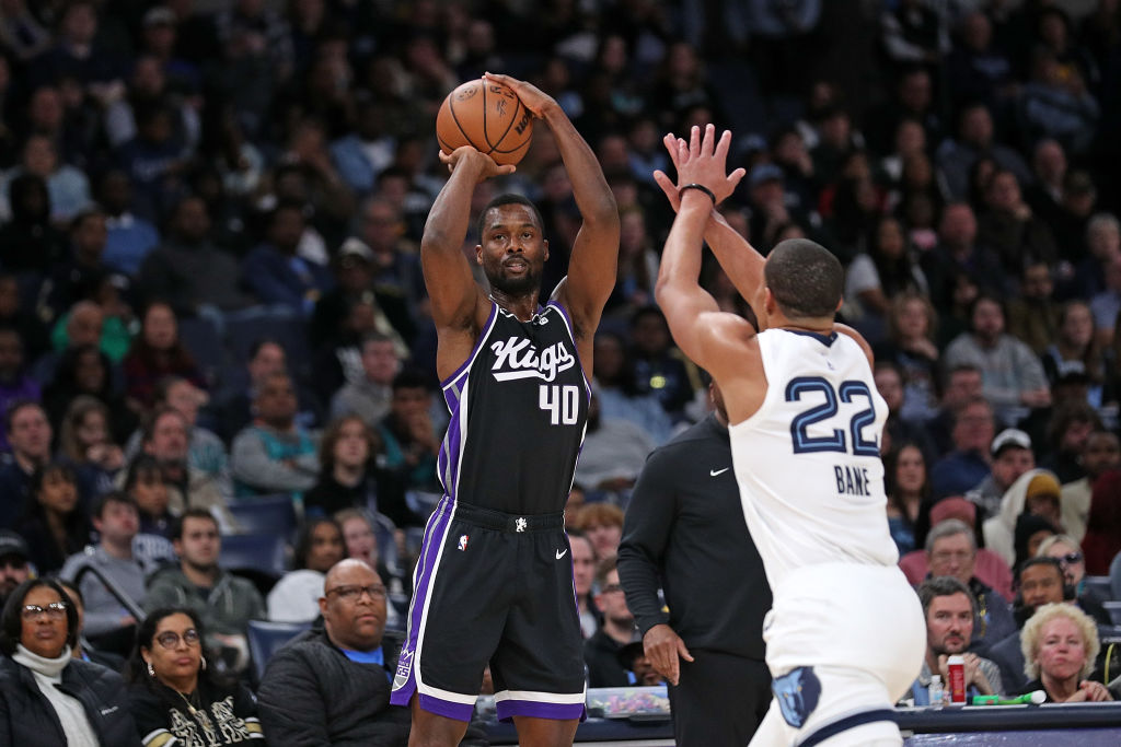 Harrison Barnes #40 of the Sacramento Kings takes a shot during the game Desmond Bane #22 of the Me...