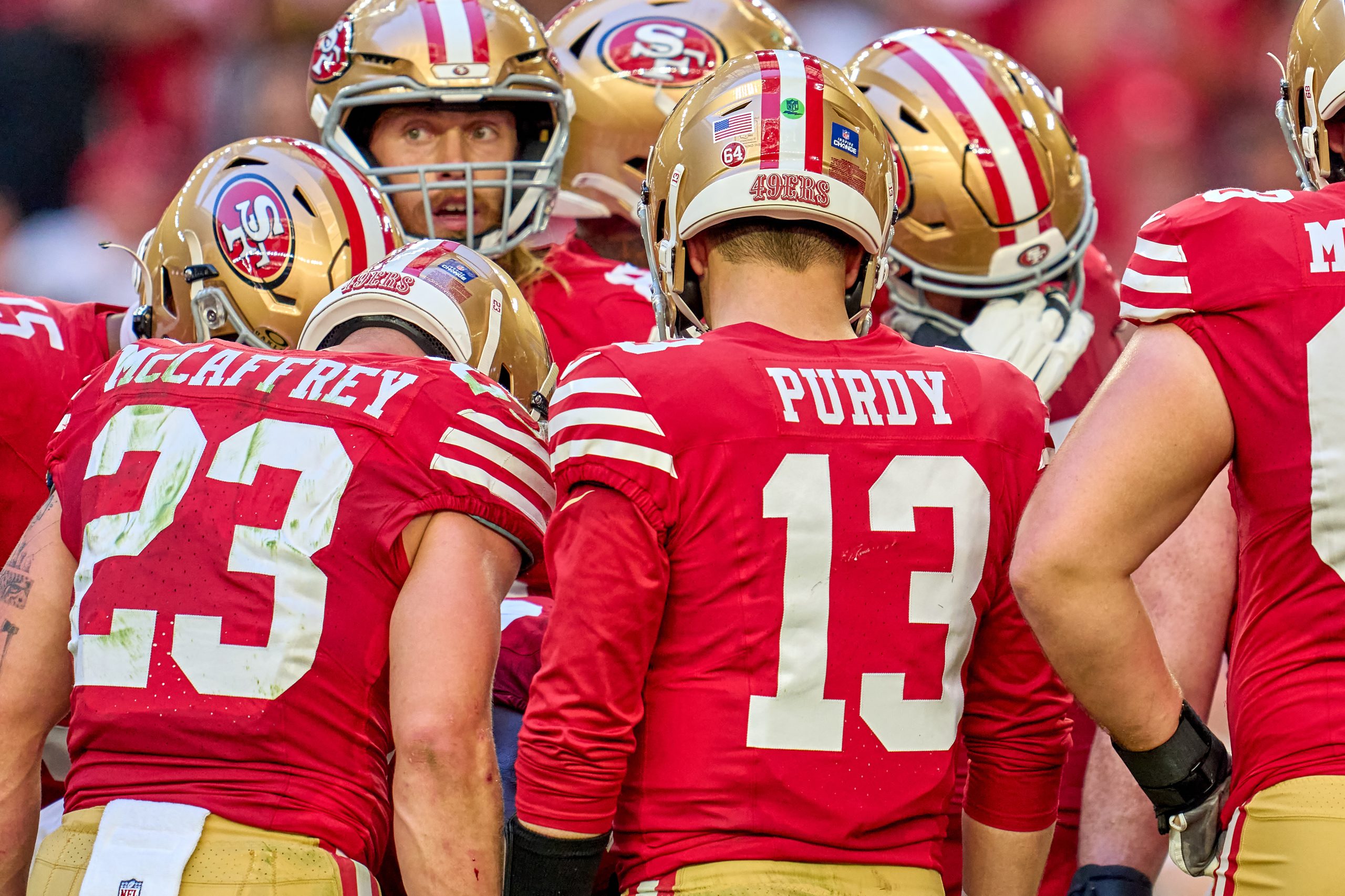 Brock Purdy #13 of the San Francisco 49ers leads a huddle in action during a game between the San F...