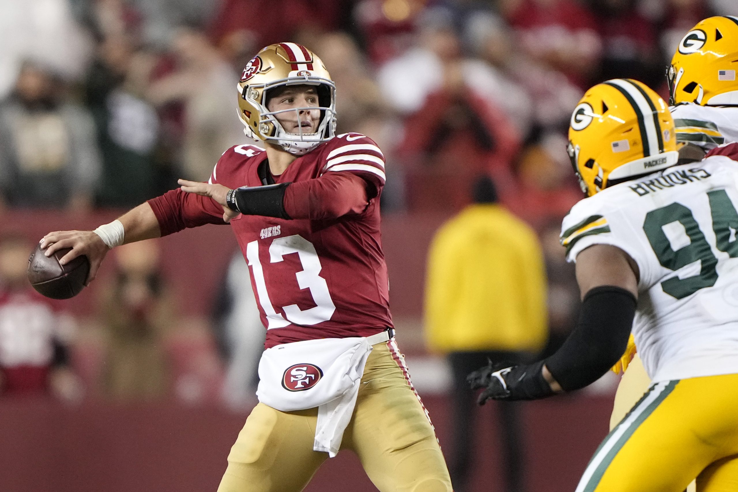 Brock Purdy #13 of the San Francisco 49ers looks to pass during the second half against the Green B...