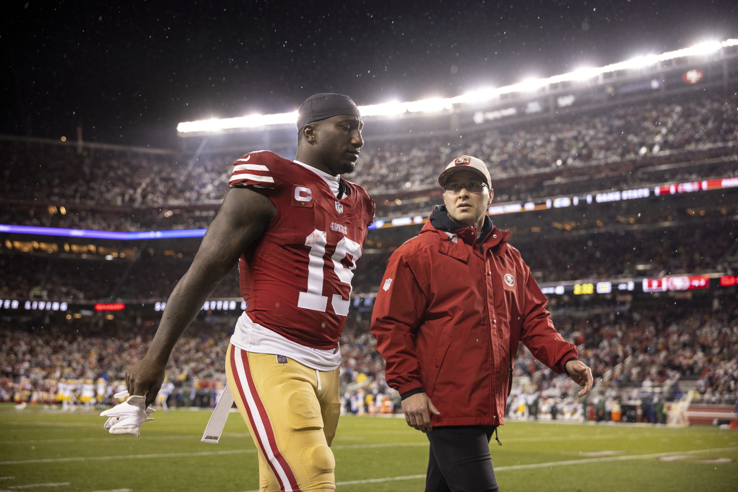 Deebo Samuel #19 of the San Francisco 49ers reacts as he walks off the field for an apparent injury...