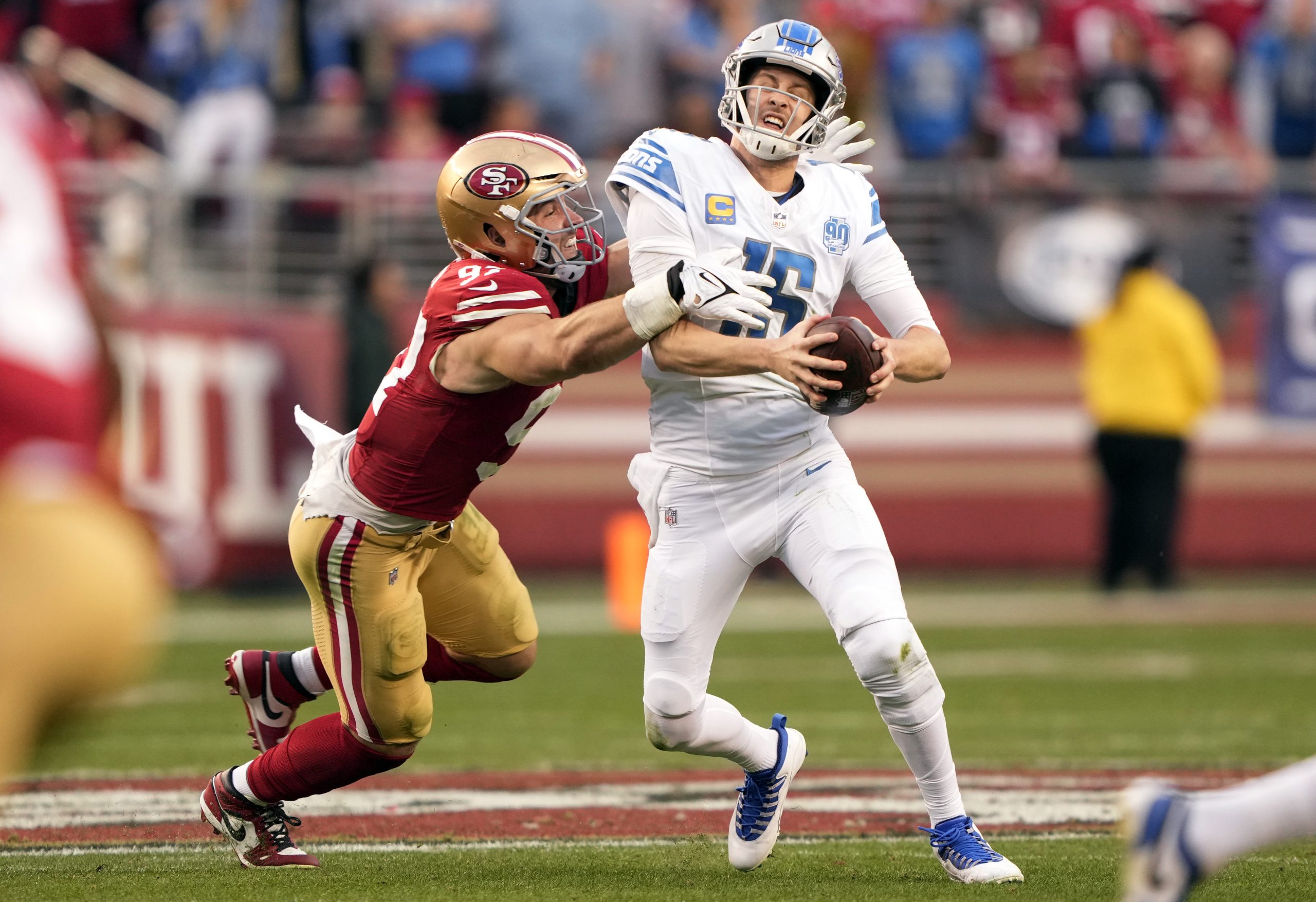 Jared Goff #16 of the Detroit Lions is sacked by Nick Bosa #97 of the San Francisco 49ers during th...