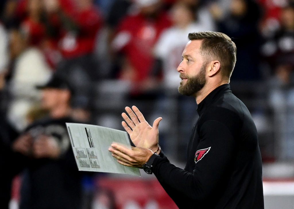 Head coach Kliff Kingsbury of the Arizona Cardinals coaches during pre-game warm-ups prior to the g...