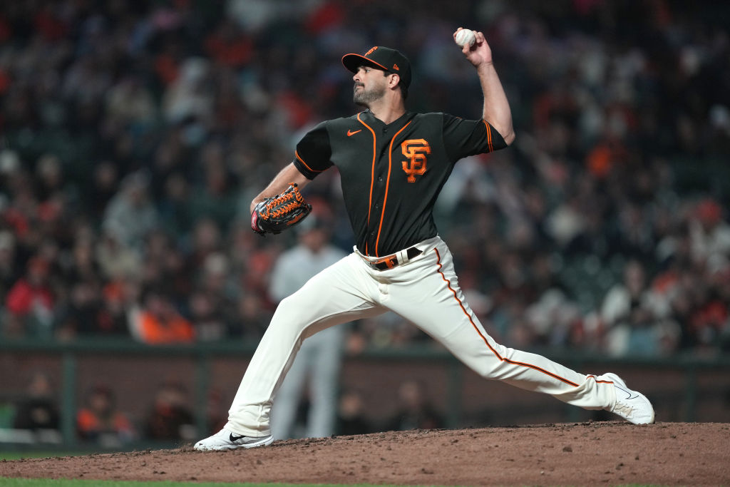 Scott Alexander #54 of the San Francisco Giants pitches against the Colorado Rockies in the eighth ...