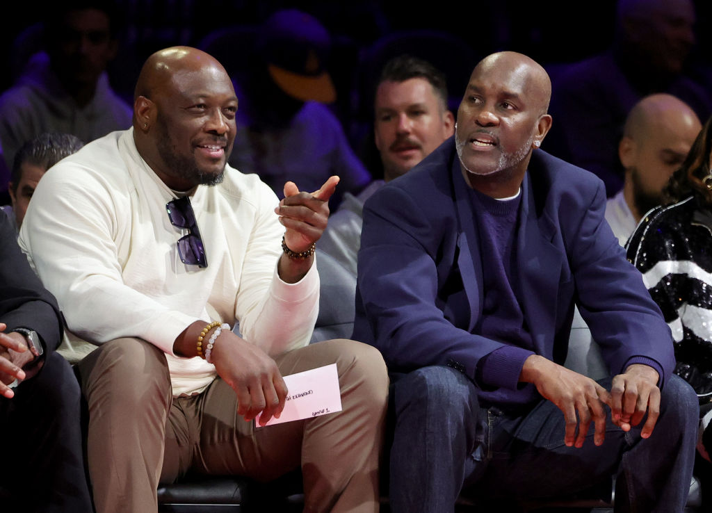 Mitch Richmond (L) and Gary Payton attend the East semifinal game of the inaugural NBA In-Season To...