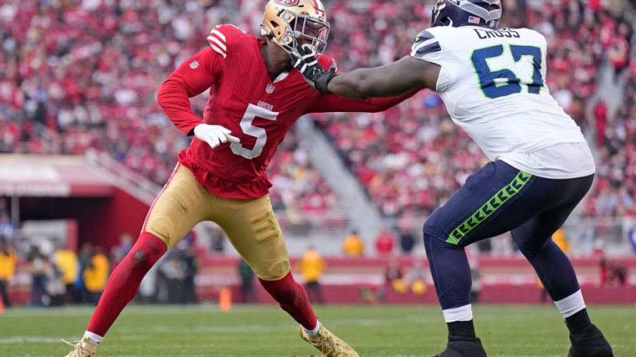 Randy Gregory #5 of the San Francisco 49ers goes up against Charles Cross #67 of the Seattle Seahawks during the second quarter at Levi's Stadium on December 10, 2023 in Santa Clara, California.