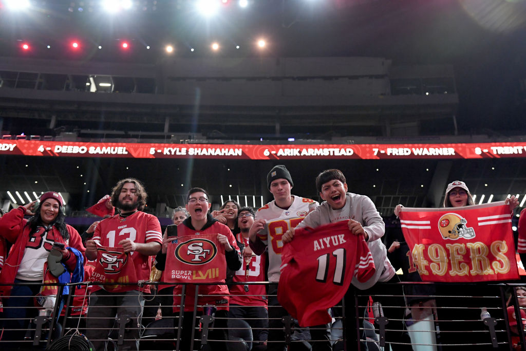 San Francisco 49ers fans cheer during Super Bowl LVIII Opening Night at Allegiant Stadium on Februa...