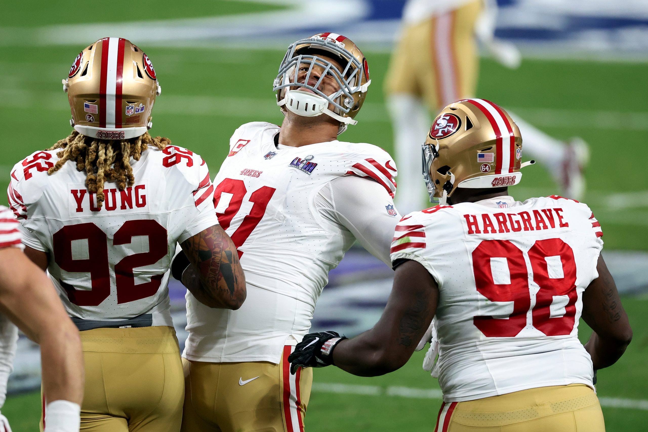Arik Armstead #91 of the San Francisco 49ers reacts with teammates after a defensive stop in the se...