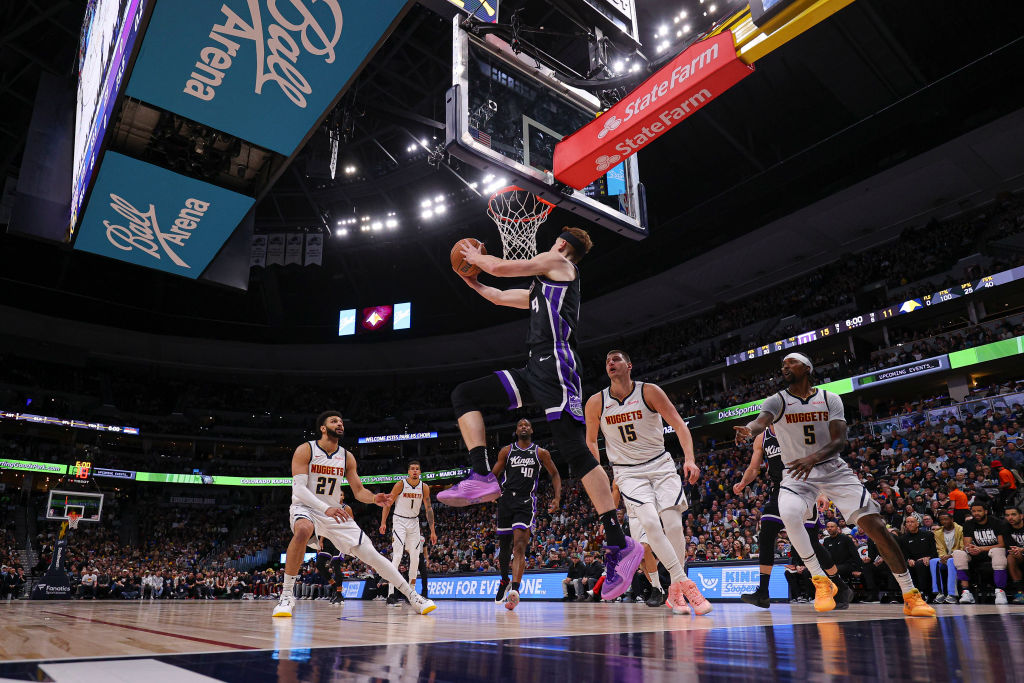 Kevin Huerter #9 of the Sacramento Kings goes for a lay up during the first quarter of the game aga...