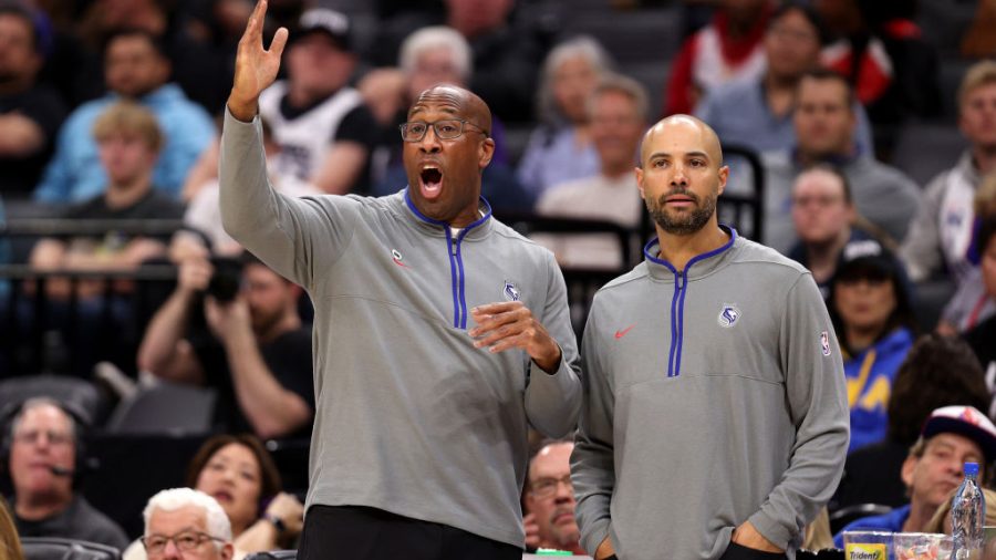 Sacramento Kings head coach Mike Brown (left) and assistant coach Jordi Fernandez watch their team play the Miami Heat in the first half at Golden 1 Center on February 26, 2024 in Sacramento, California.