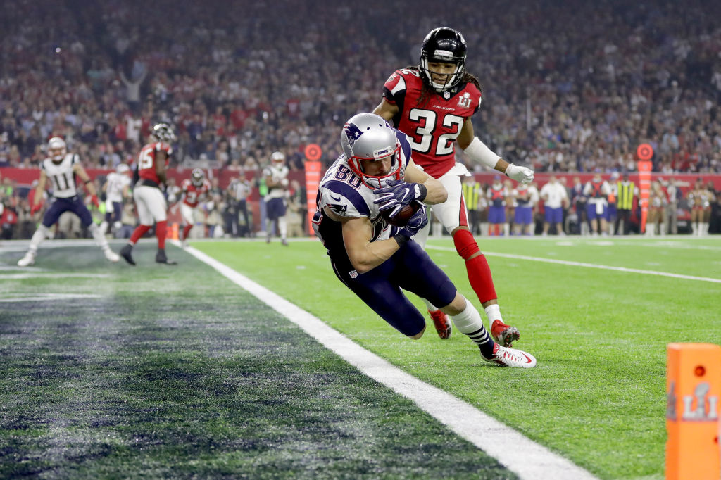 Danny Amendola #80 of the New England Patriots catches a six yard touchdown in the fourth quarter a...