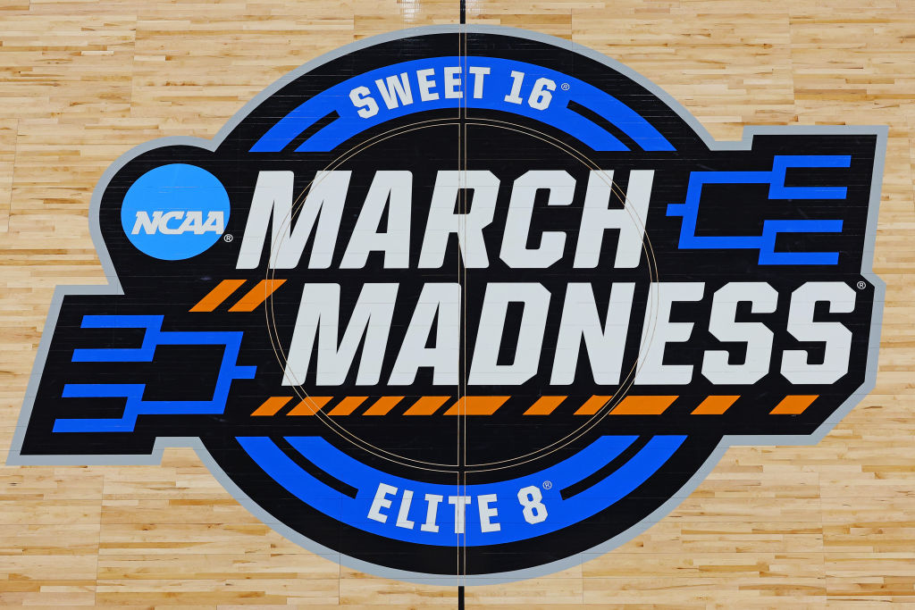 A view of the March Madness 2024 logo at center court....