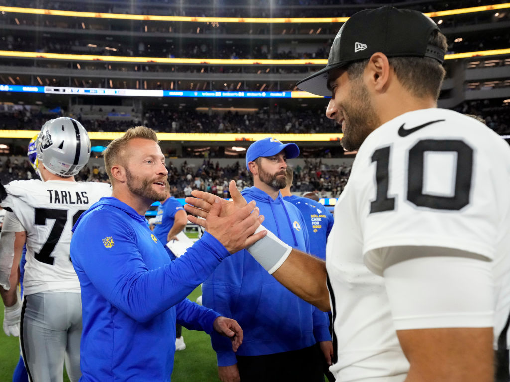 Head coach Sean McVay of the Los Angeles Rams shakes hands with quarterback Jimmy Garoppolo #10 of ...