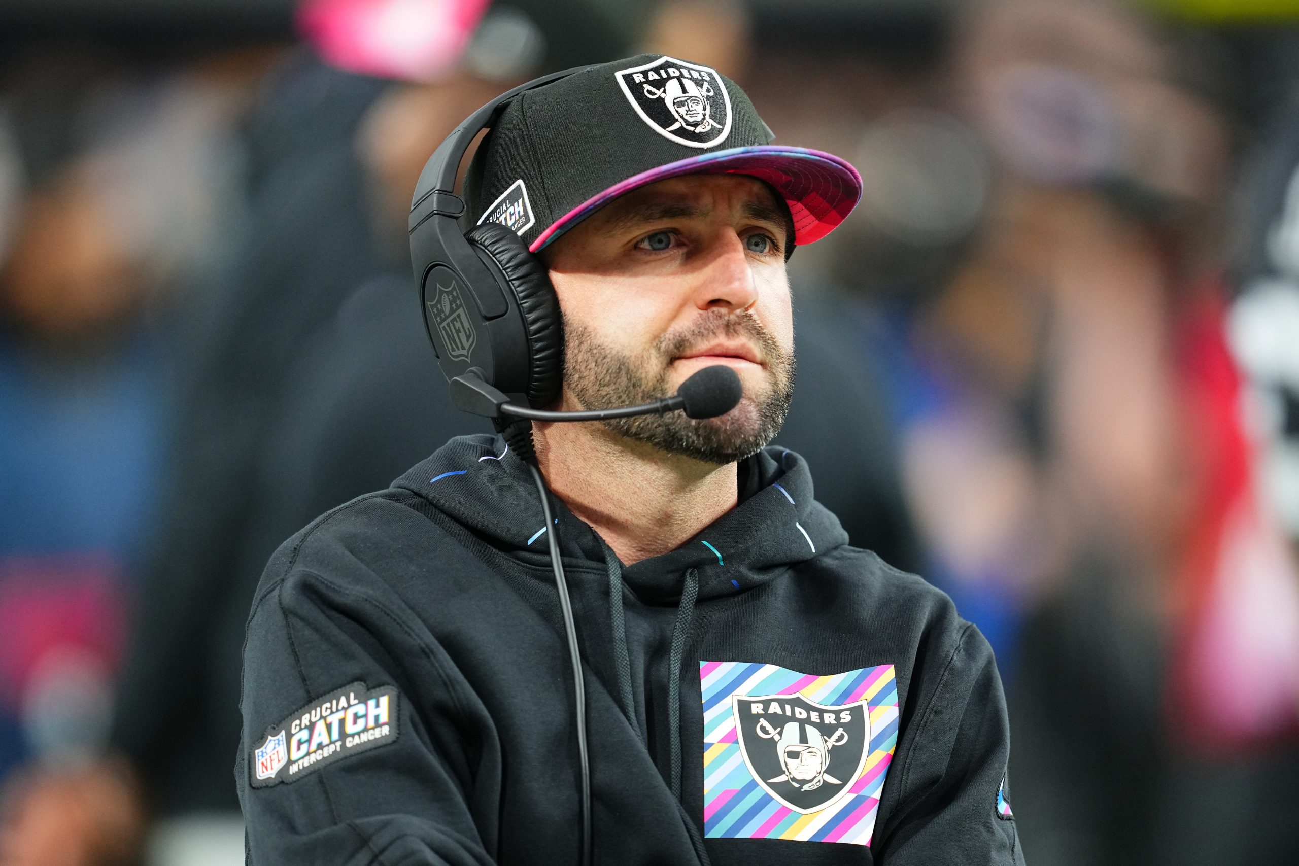 Offensive coordinator Mick Lombardi of the Las Vegas Raiders looks onbefore a game against the Gree...