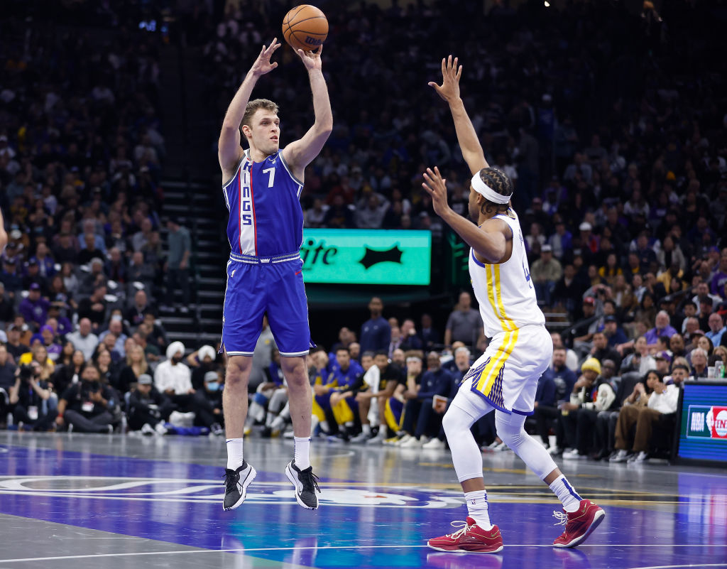 Sasha Vezenkov #7 of the Sacramento Kings shoots the ball against the Golden State Warriors in the ...